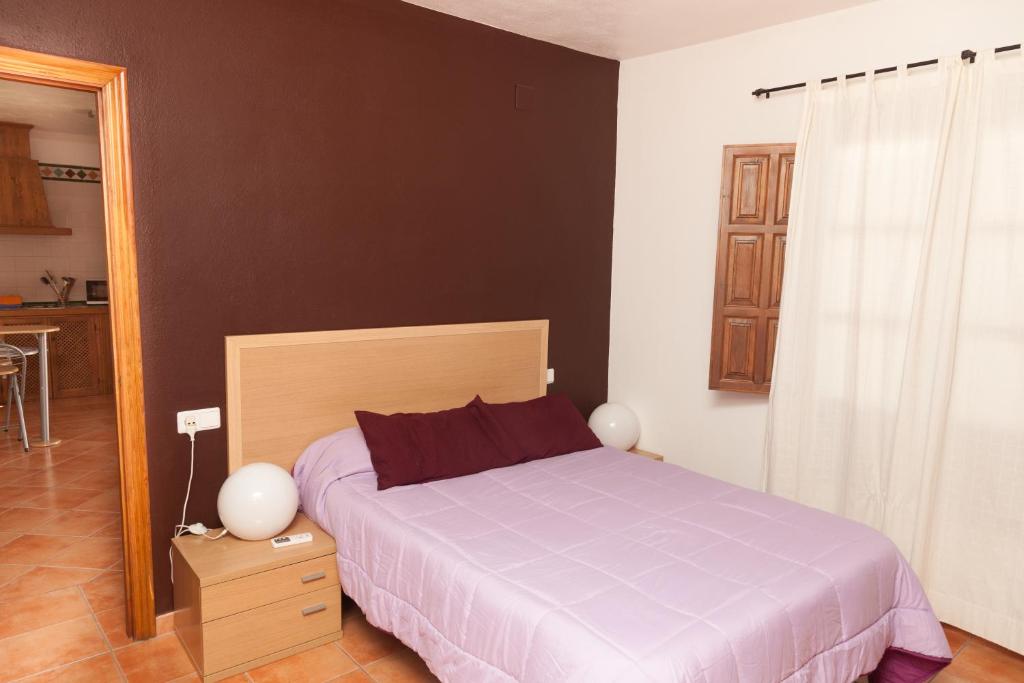 A bed or beds in a room at Casa Larga