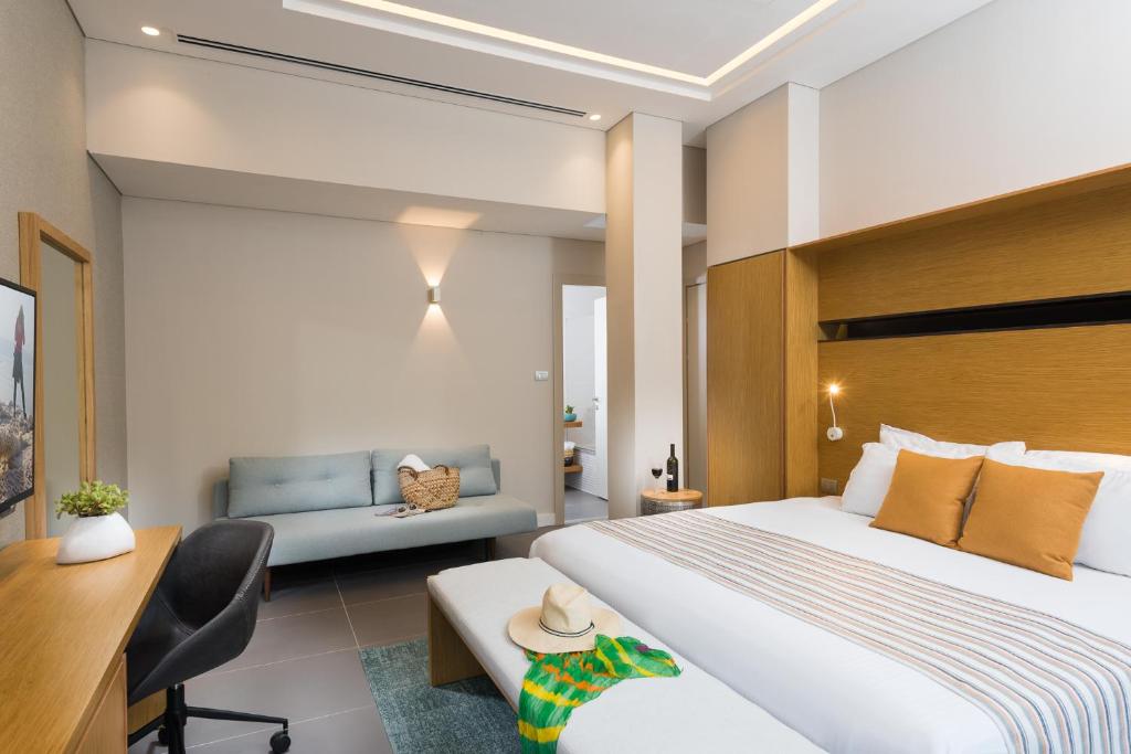 
מיטה או מיטות בחדר ב-מלון אואזיס ים המלח

