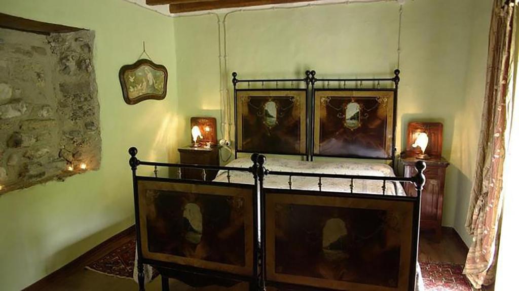 Postel nebo postele na pokoji v ubytování Hotel San Gerolamo