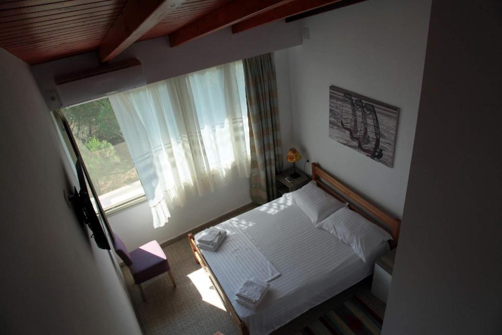 Postel nebo postele na pokoji v ubytování Hotel Princi i Vogel