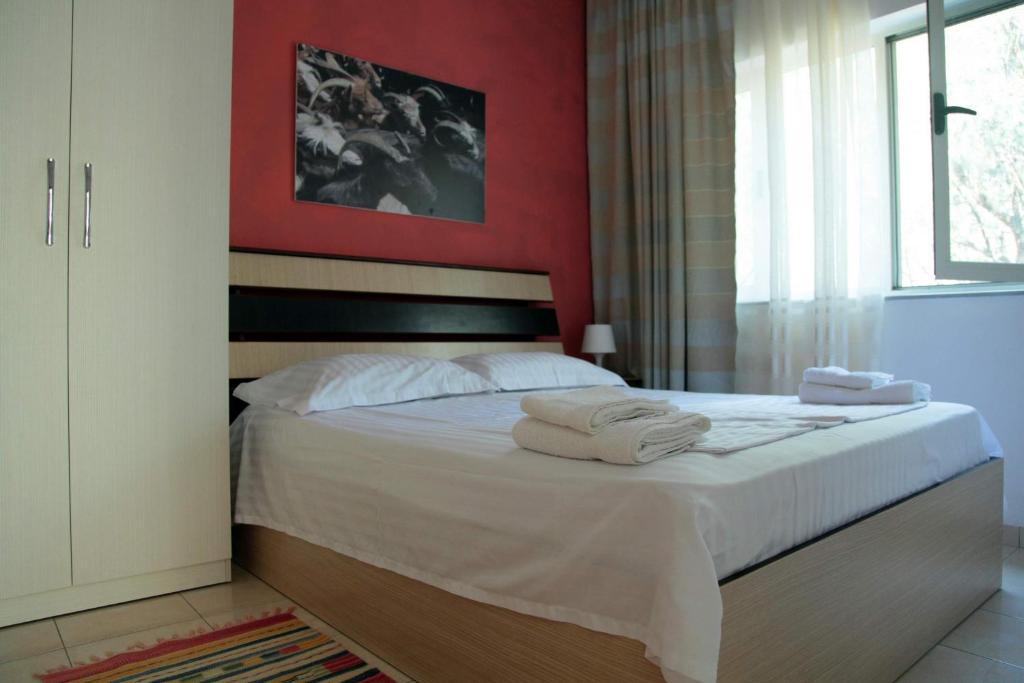 Postel nebo postele na pokoji v ubytování Hotel Princi i Vogel