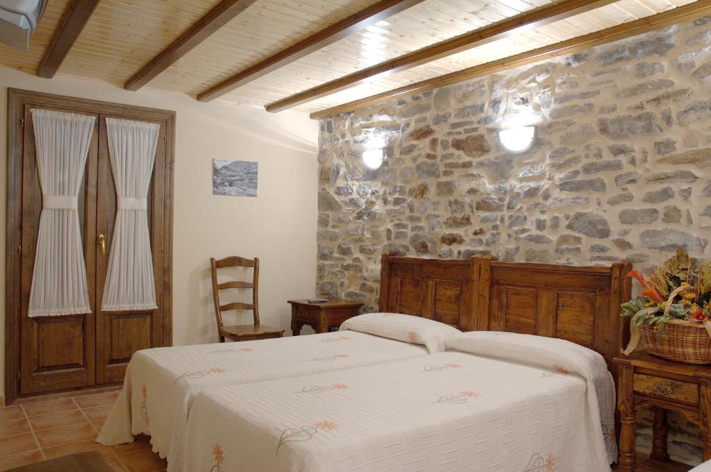 A bed or beds in a room at Apartamento el Hogar Casa Cajal