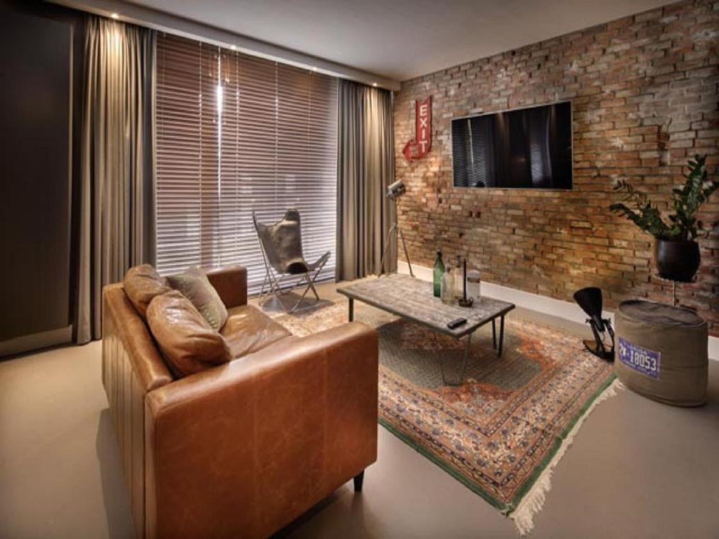 TV a/nebo společenská místnost v ubytování Van der Valk Hotel Sassenheim - Leiden