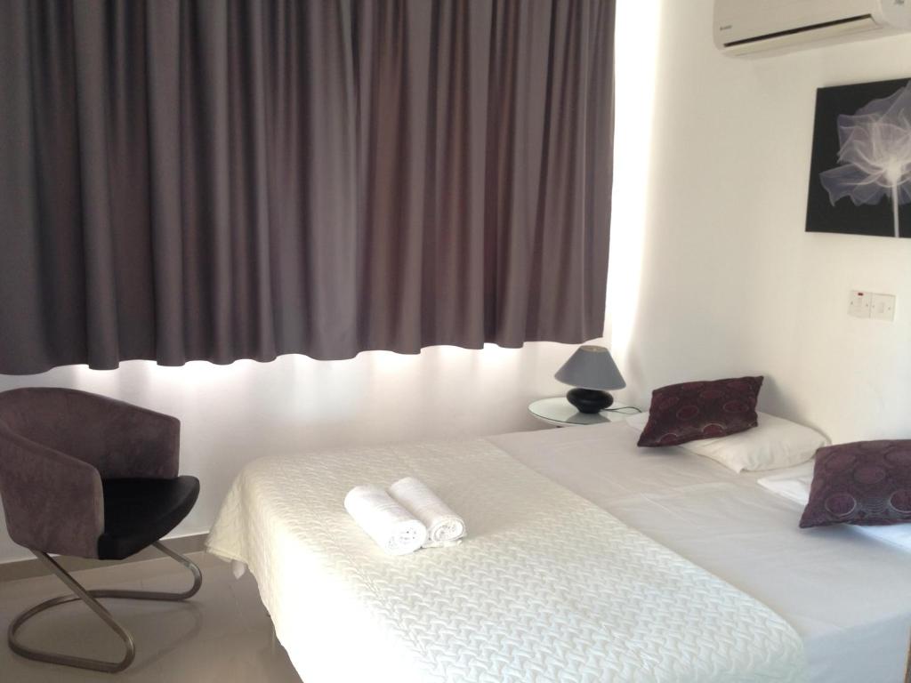 Postel nebo postele na pokoji v ubytování Panklitos Tourist Apartments