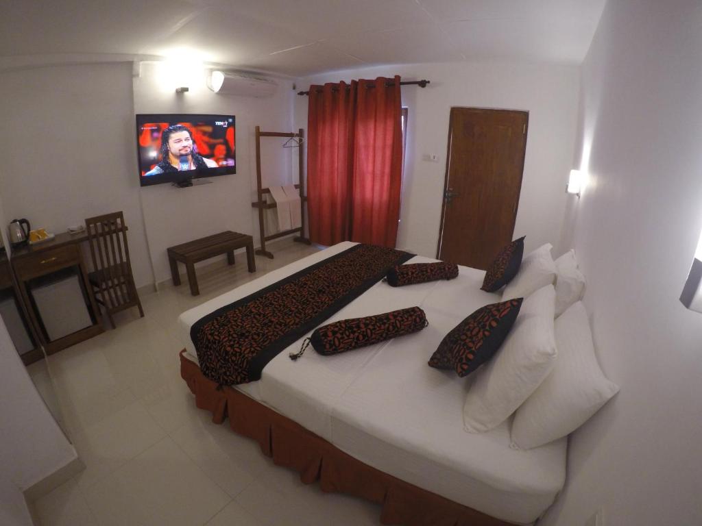 Postel nebo postele na pokoji v ubytování Hotel Sunray