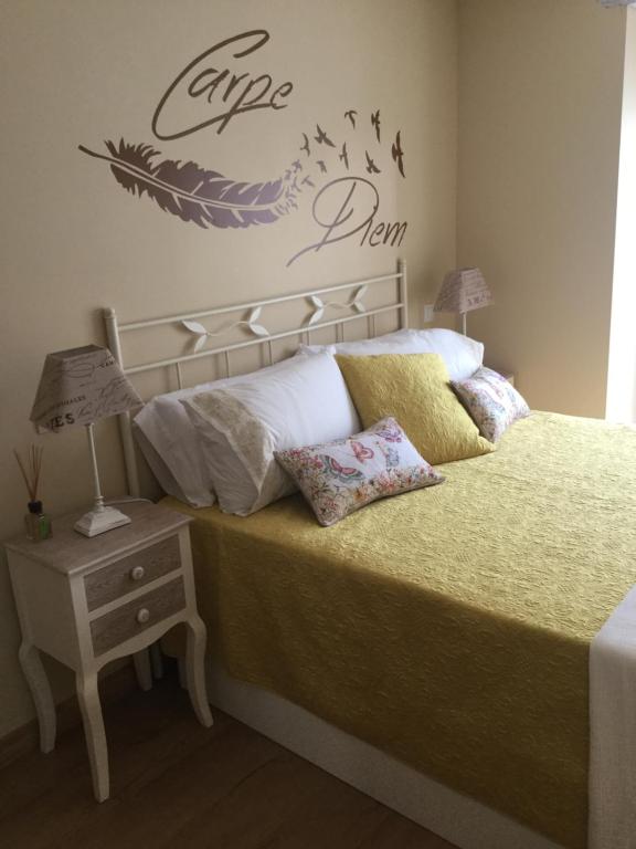 A bed or beds in a room at vivienda vieja cepa