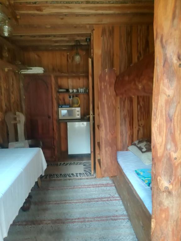 Posteľ alebo postele v izbe v ubytovaní Zbójnickie izby