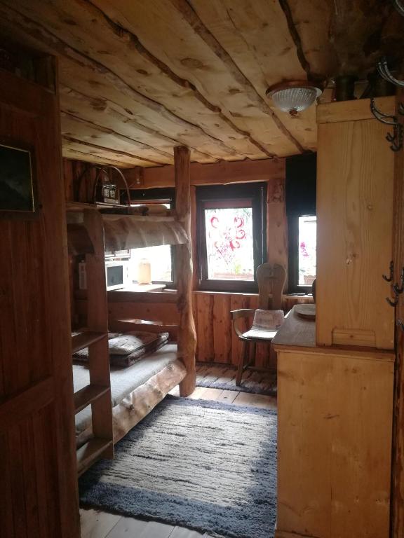 Posteľ alebo postele v izbe v ubytovaní Zbójnickie izby