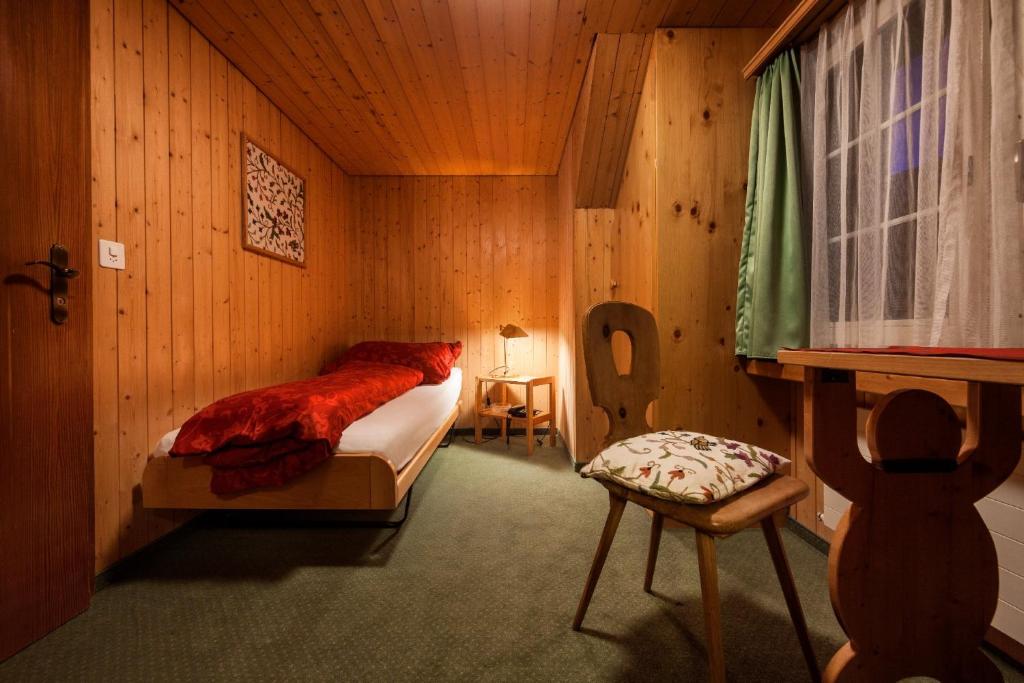 Postel nebo postele na pokoji v ubytování Hotel Arlenwald