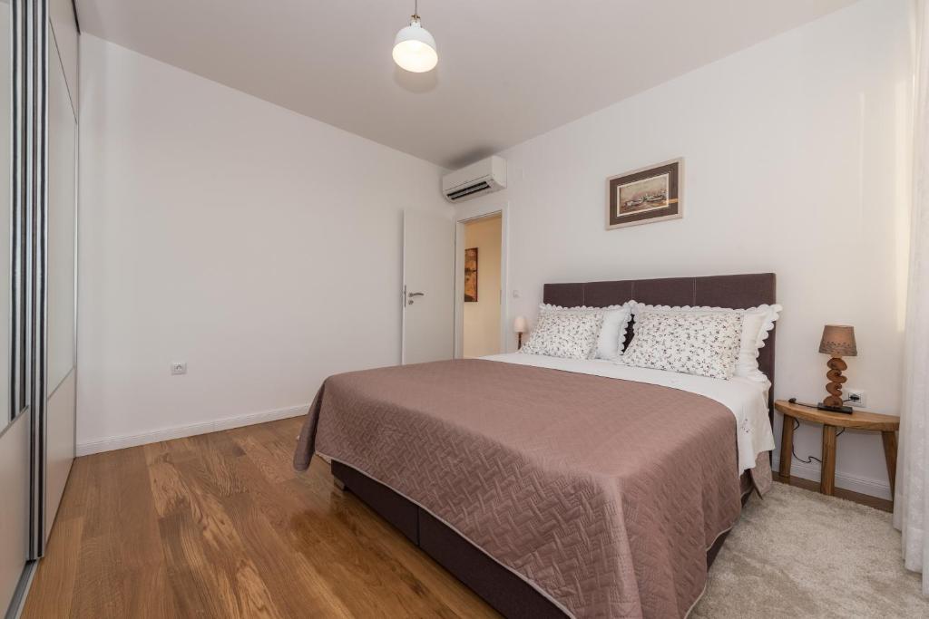 Posteľ alebo postele v izbe v ubytovaní Amazing View Apartment