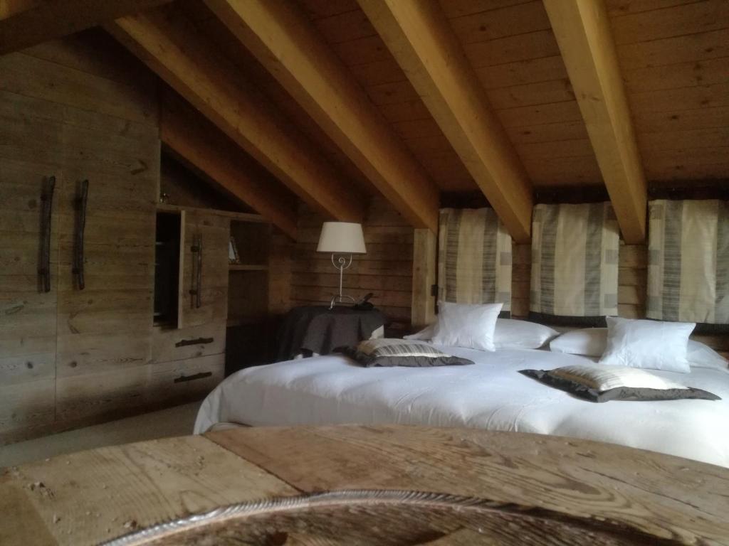 Postel nebo postele na pokoji v ubytování Hotel Bait de Angial