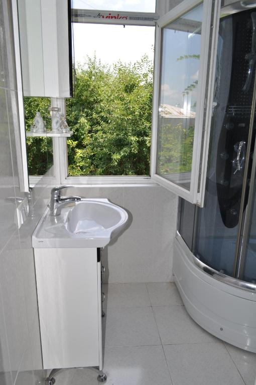 Koupelna v ubytování Guest House Cico