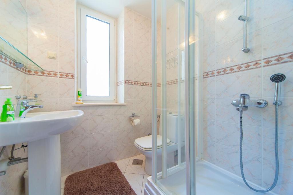 Kúpeľňa v ubytovaní Apartment Katinka