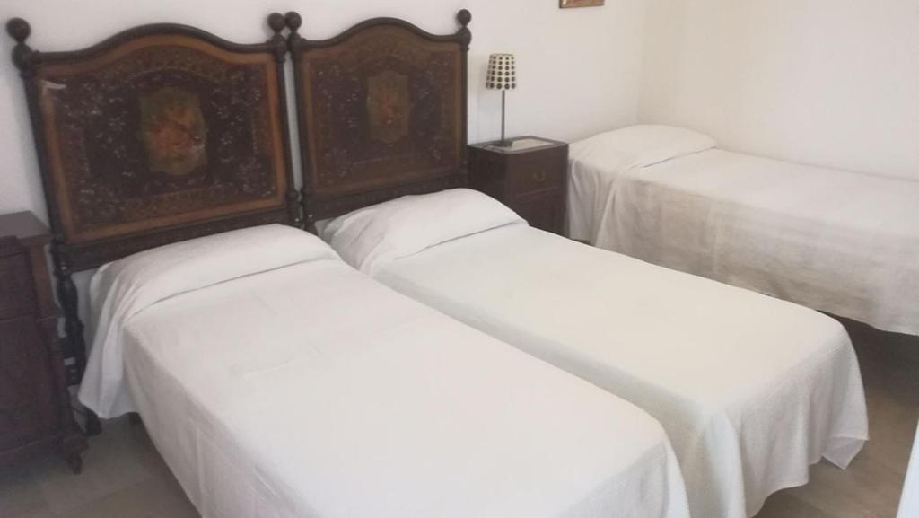 Postel nebo postele na pokoji v ubytování Crispi 10