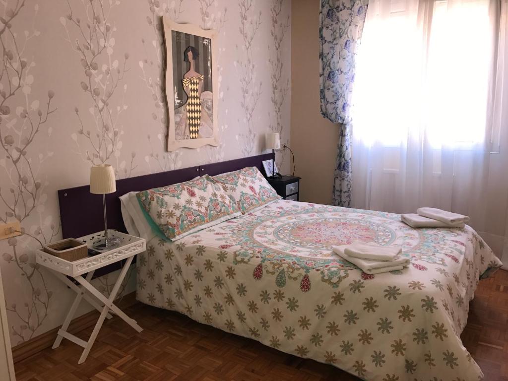 Postel nebo postele na pokoji v ubytování Alojamientos Olga