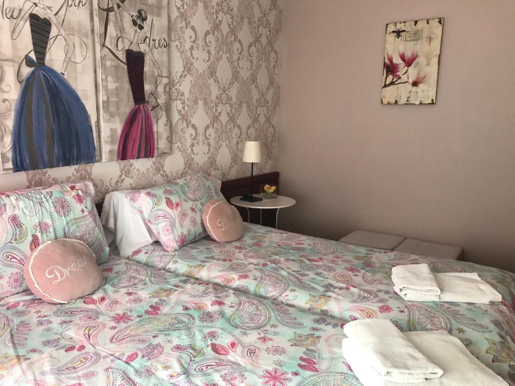 Postel nebo postele na pokoji v ubytování Alojamientos Olga