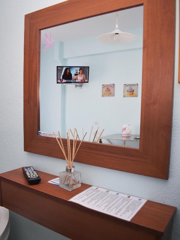 TV a/nebo společenská místnost v ubytování Ainalis Apartments