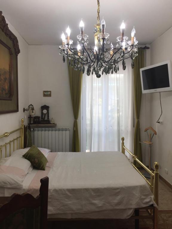 Postel nebo postele na pokoji v ubytování locazione turistica Sole