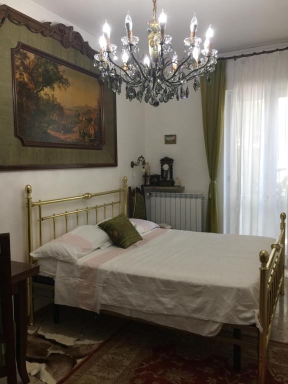Postel nebo postele na pokoji v ubytování locazione turistica Sole