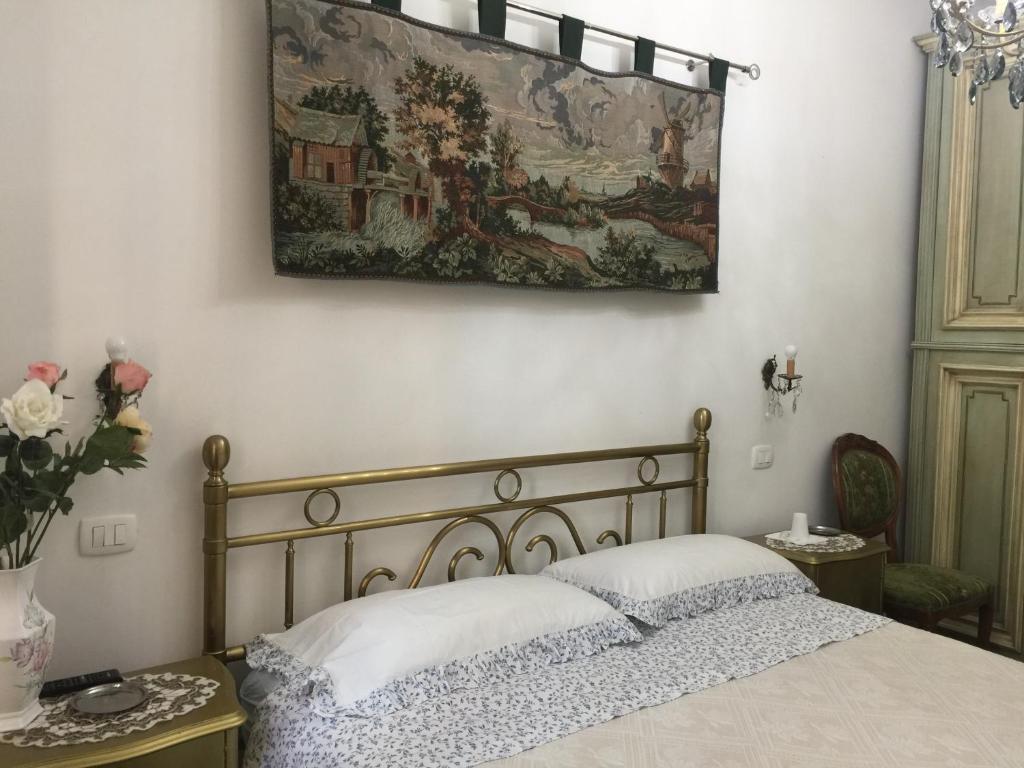 Postel nebo postele na pokoji v ubytování locazione turistica Sole