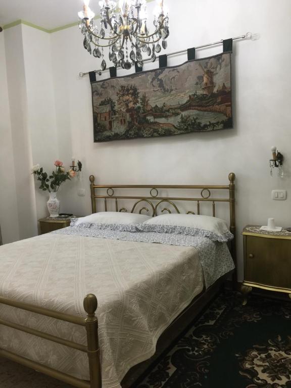 Postel nebo postele na pokoji v ubytování locazione turistica Sole
