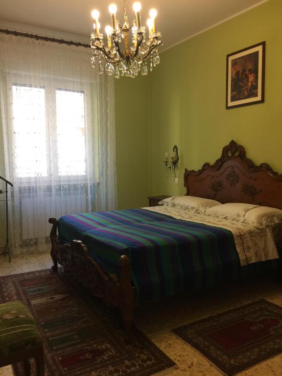 Postel nebo postele na pokoji v ubytování locazione turistica Sole