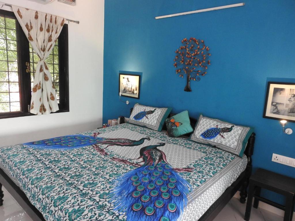 Postel nebo postele na pokoji v ubytování The Coral Tree Boutique Homestay
