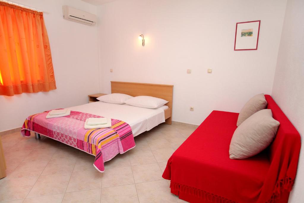 Postel nebo postele na pokoji v ubytování Cvita apartments