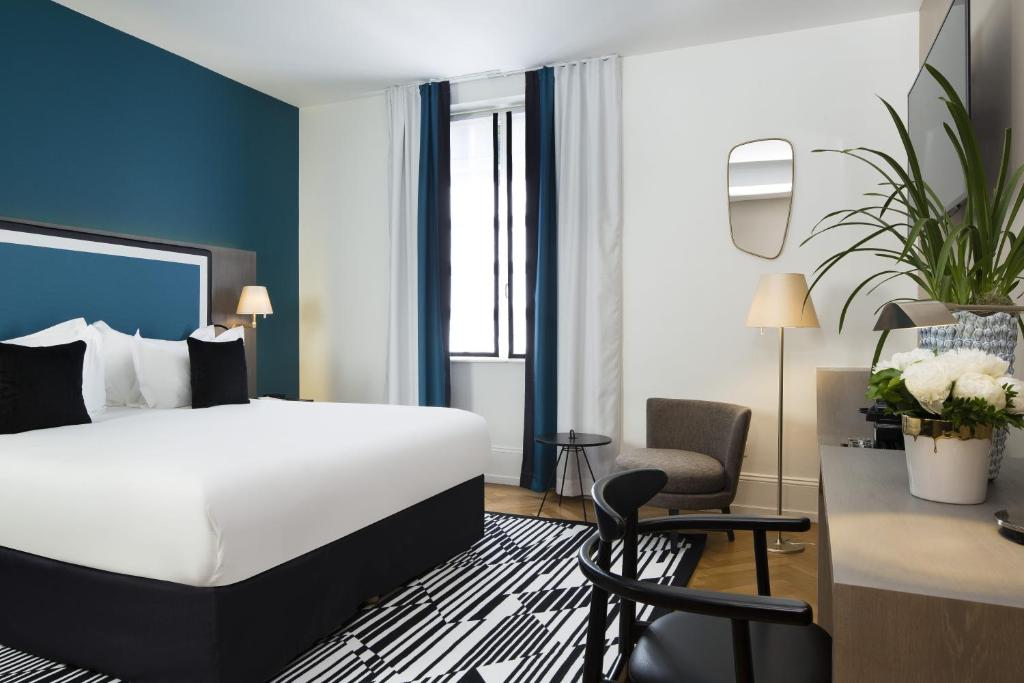 Postel nebo postele na pokoji v ubytování Boutique Hotel Des XV