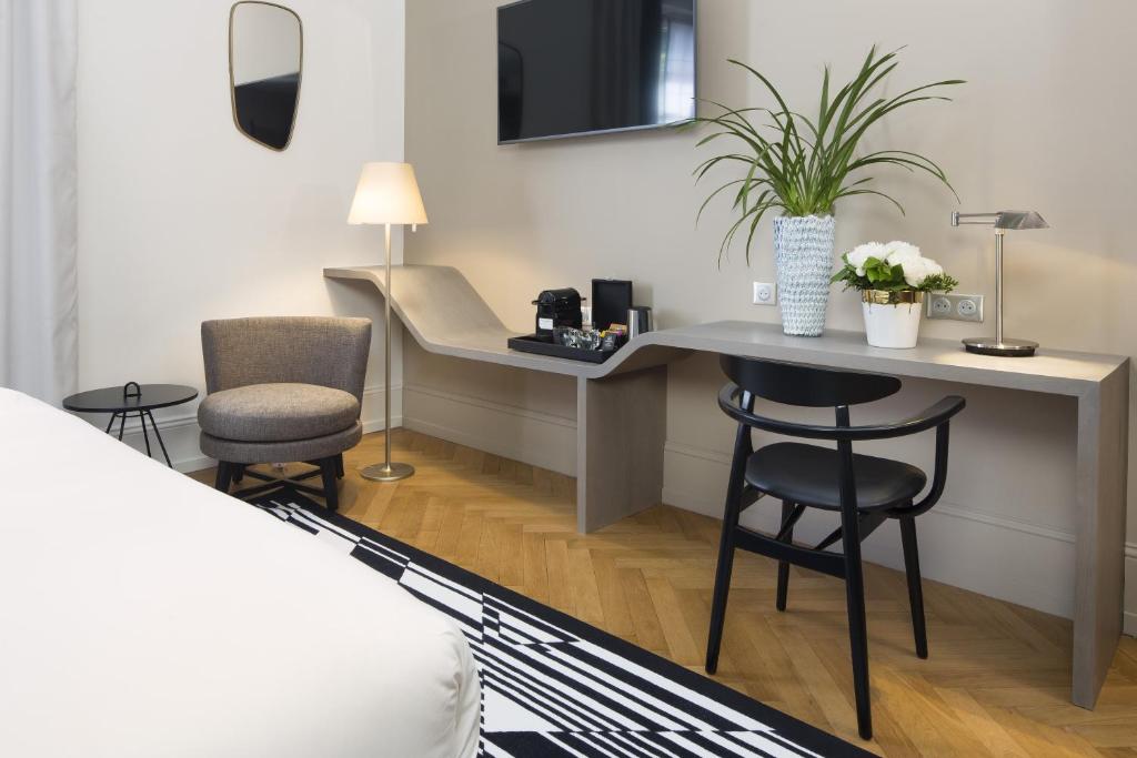 TV a/nebo společenská místnost v ubytování Boutique Hotel Des XV