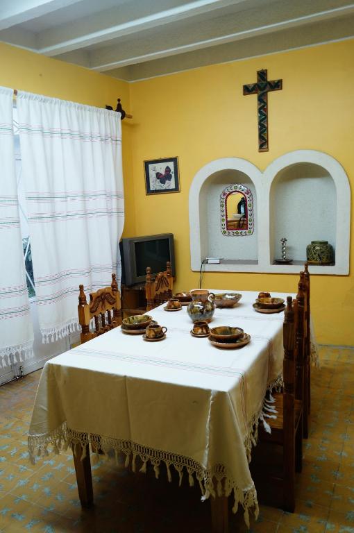 TV a/nebo společenská místnost v ubytování Casa Tecolote