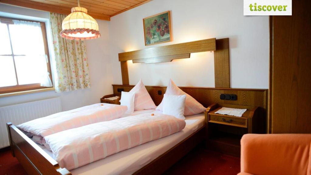 Postel nebo postele na pokoji v ubytování Gastehaus Wolf