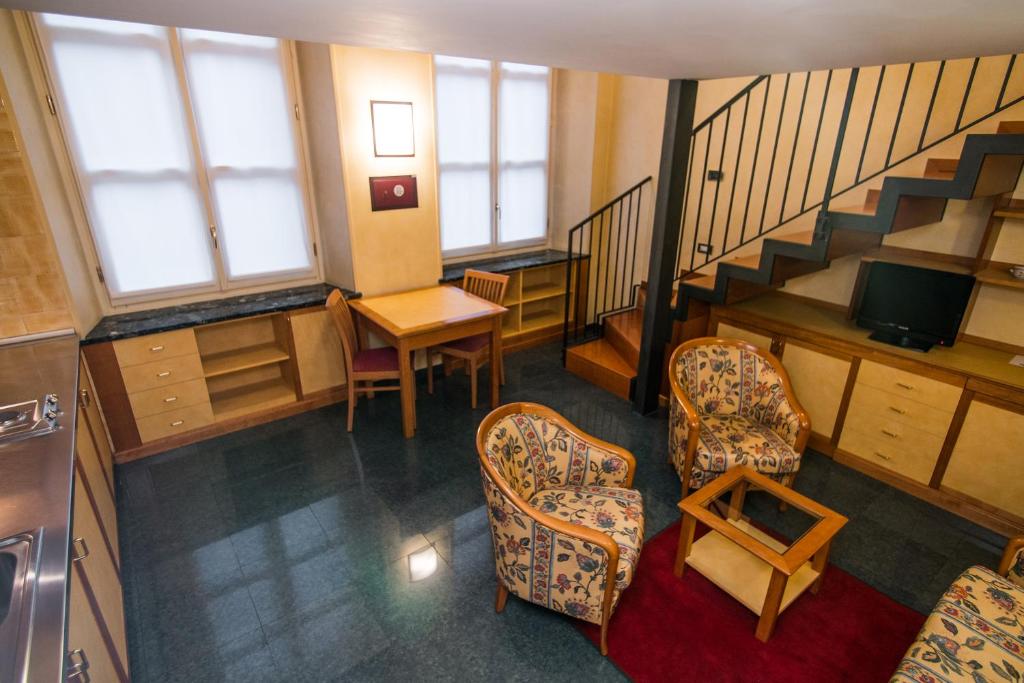 Posezení v ubytování Le Petit Hotel