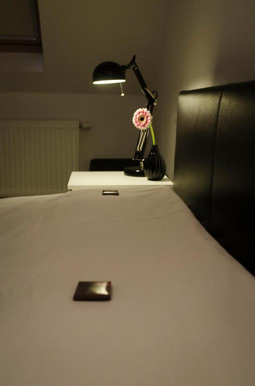 Postel nebo postele na pokoji v ubytování upstairs9000