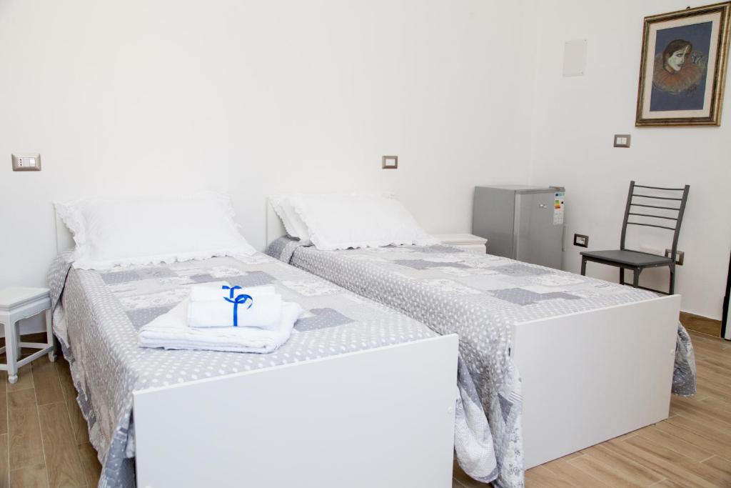 Postel nebo postele na pokoji v ubytování La Posento