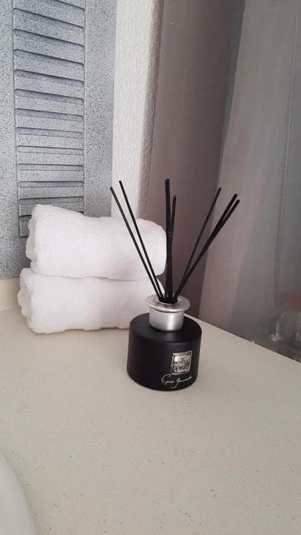 Una cama o camas en una habitación de Ti Koala