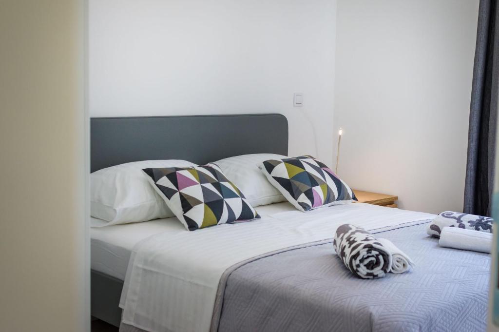 Postel nebo postele na pokoji v ubytování D. Marine Apartments