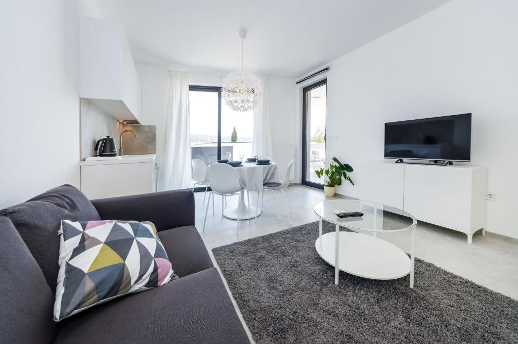 TV a/nebo společenská místnost v ubytování D. Marine Apartments