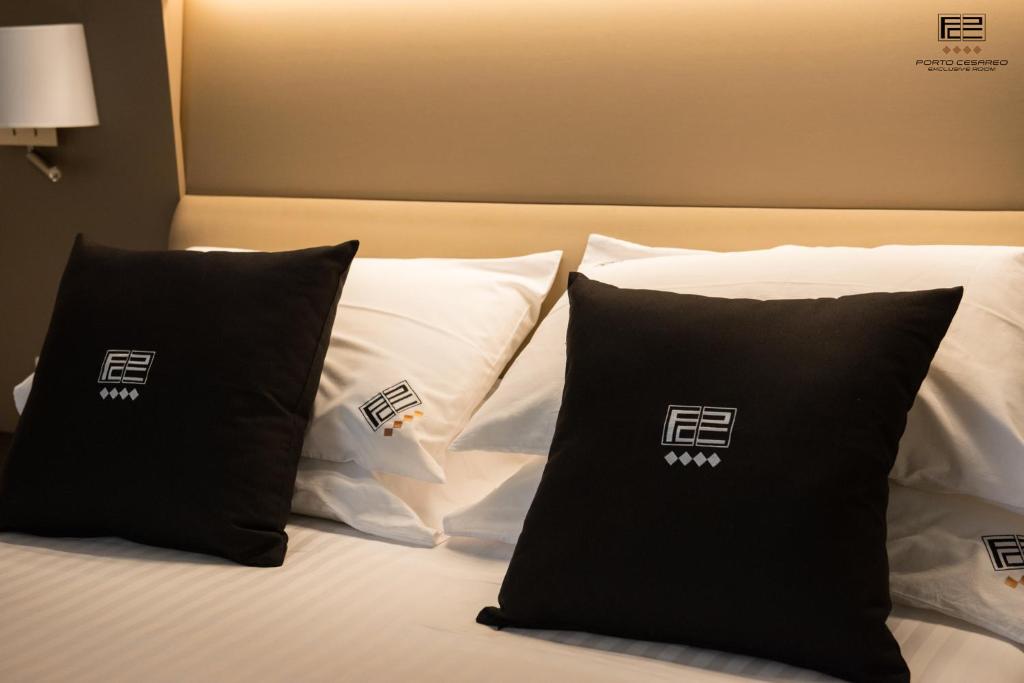 Postel nebo postele na pokoji v ubytování Porto Cesareo Exclusive Room