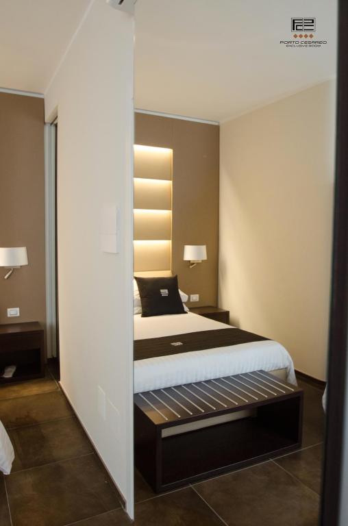 Postel nebo postele na pokoji v ubytování Porto Cesareo Exclusive Room
