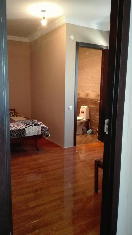Postel nebo postele na pokoji v ubytování Goga Guesthouse