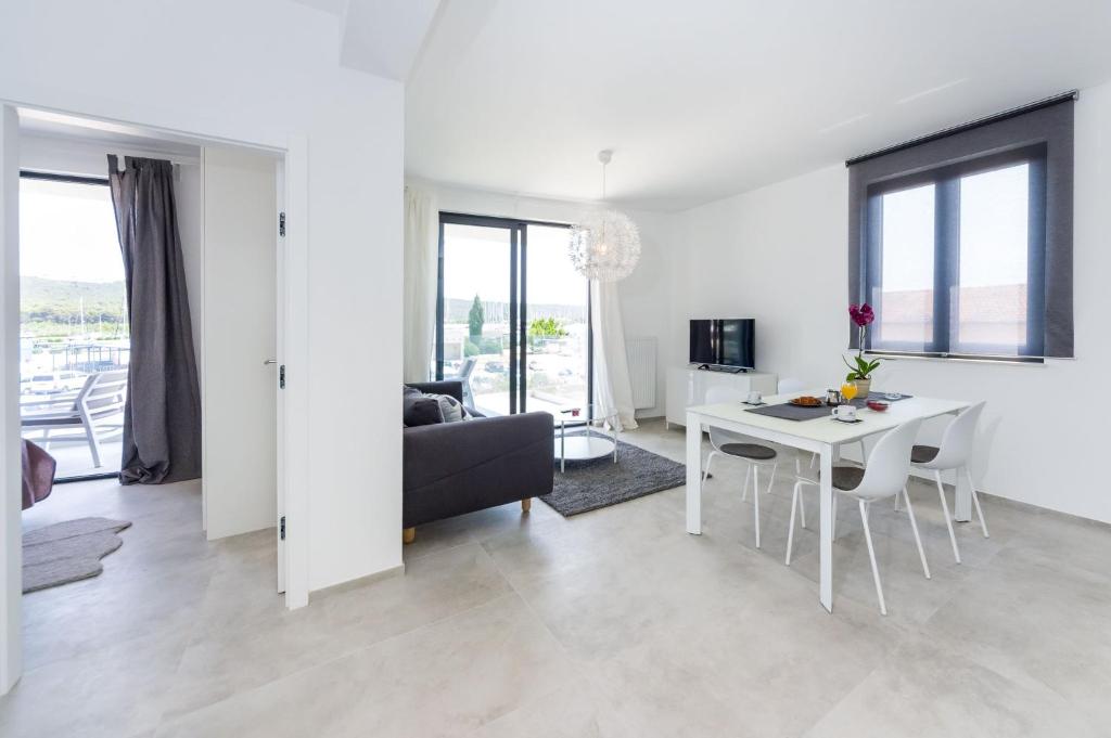 TV a/nebo společenská místnost v ubytování D. Marine Apartments