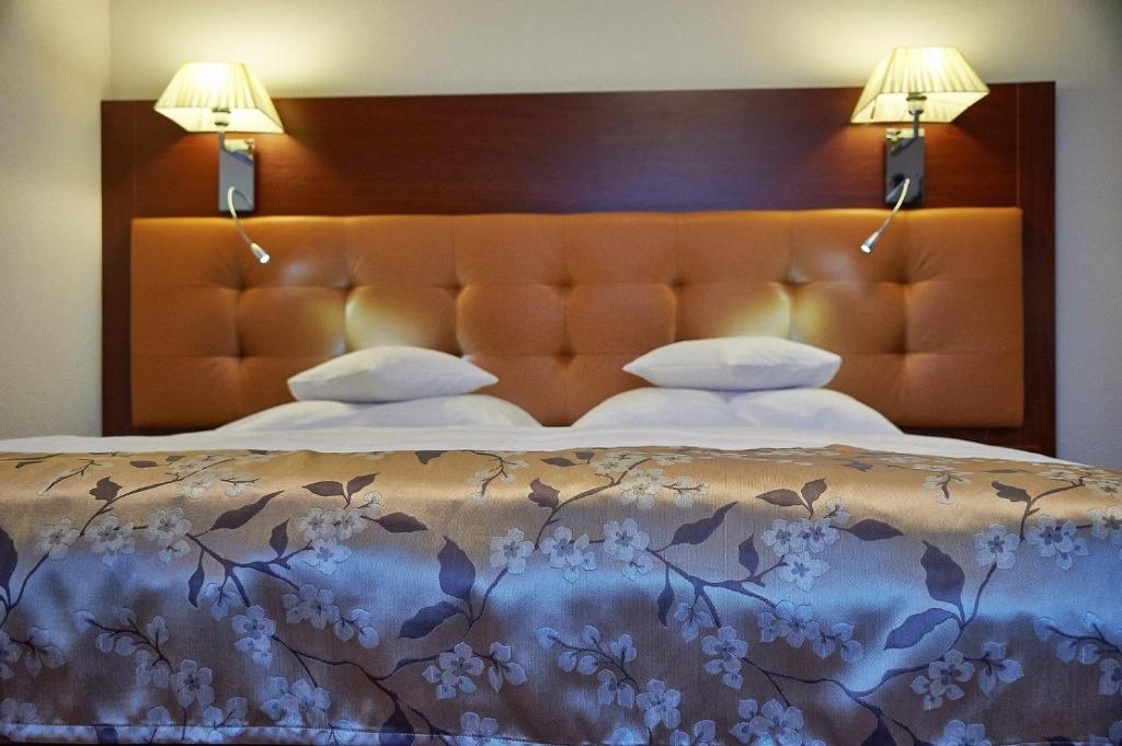Postel nebo postele na pokoji v ubytování Hotel Wendelstein