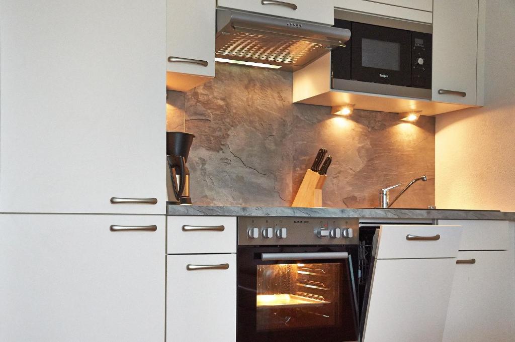 Kuchyň nebo kuchyňský kout v ubytování Hotel Wendelstein