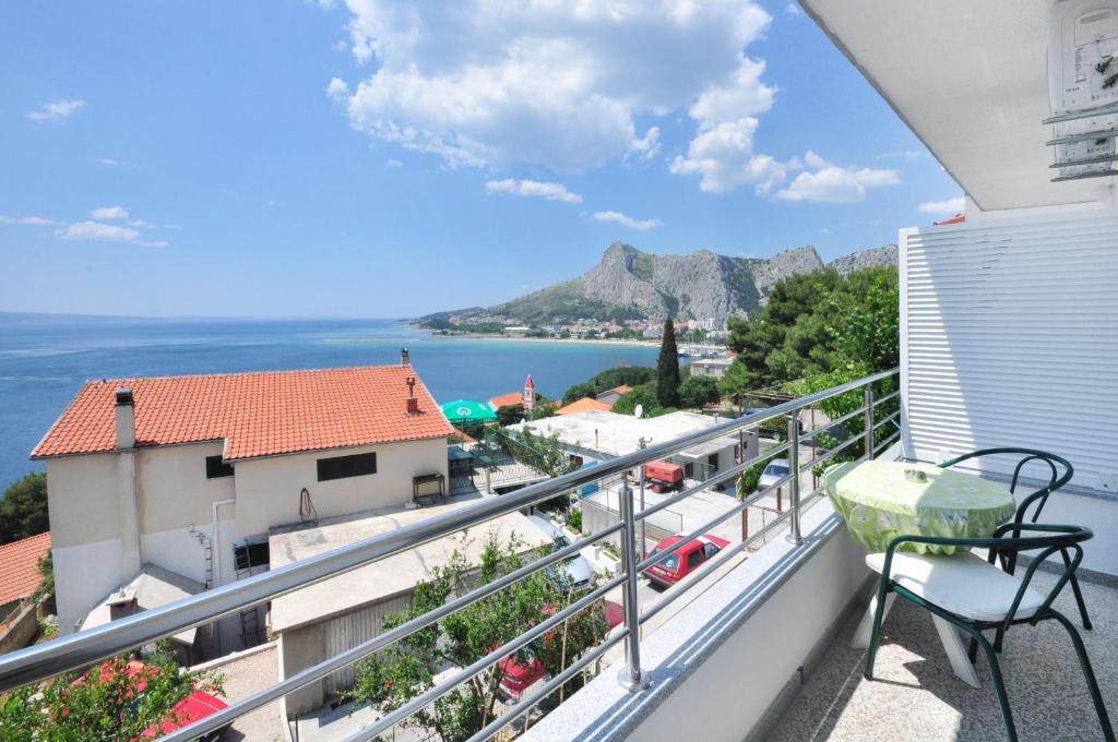 a balcony with a view of the ocean at Apartments Zorka Leko in Omiš