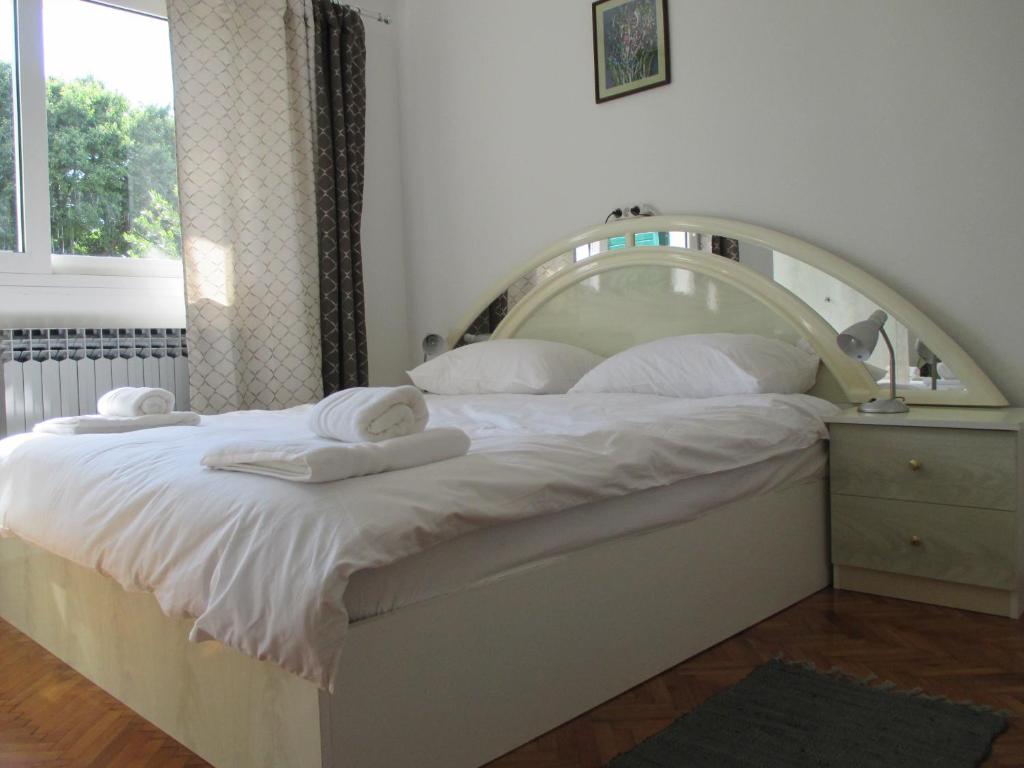 Posteľ alebo postele v izbe v ubytovaní Lemon Tree Apartments