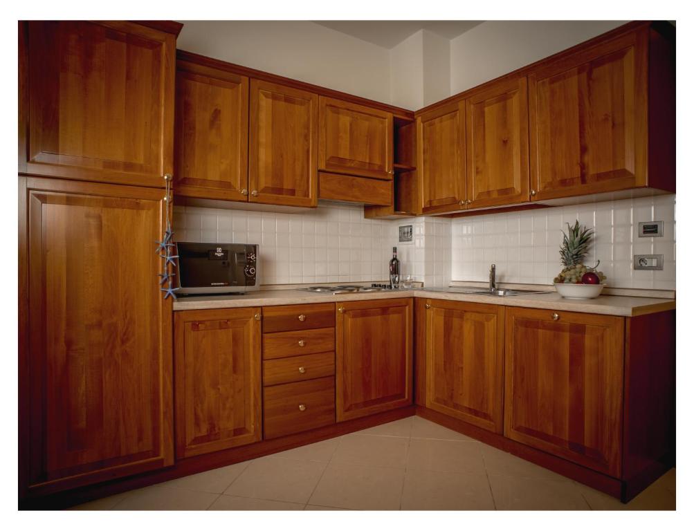 A kitchen or kitchenette at Lido Resort