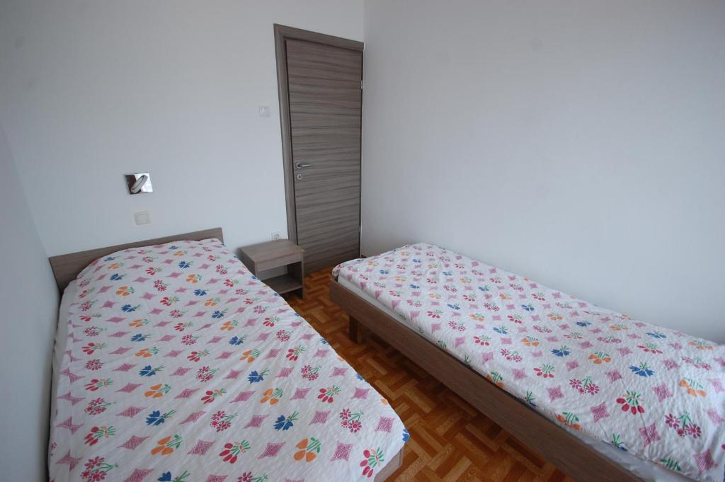 Posteľ alebo postele v izbe v ubytovaní Apartments Jakobi by El-Pi Tours