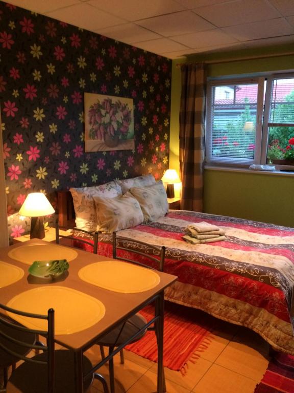 Postel nebo postele na pokoji v ubytování Lana House