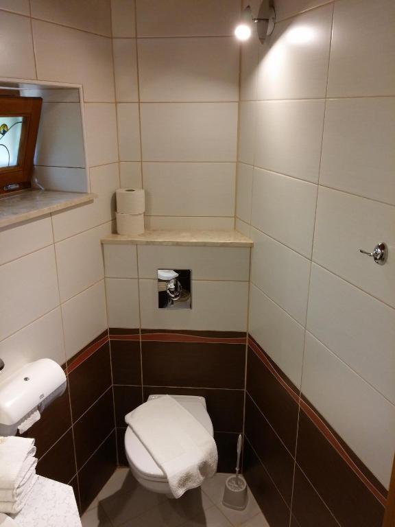 Kúpeľňa v ubytovaní Zöld sziget Apartmanház